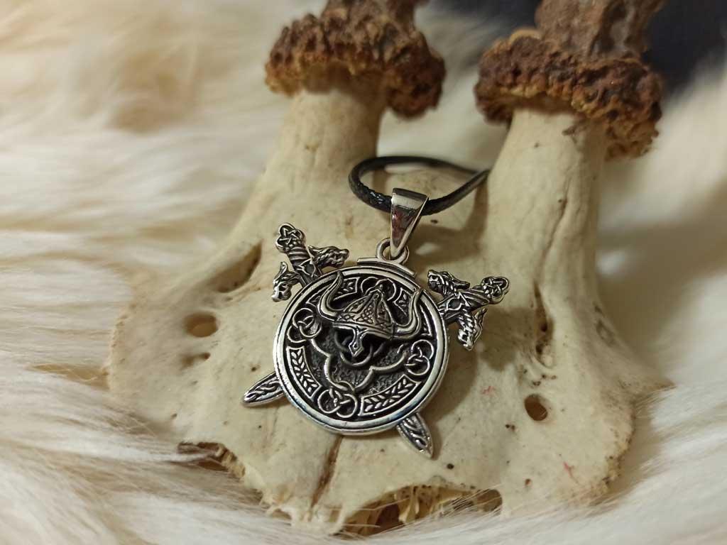 Viking helmet in the rune circle